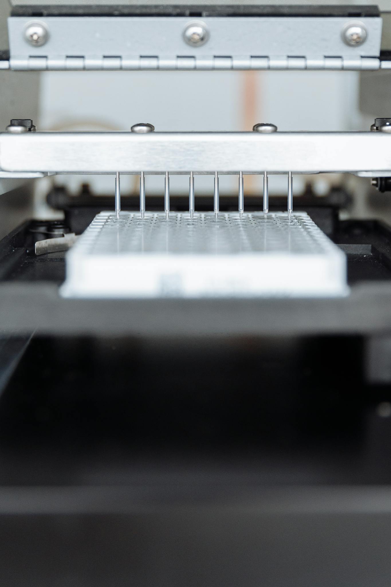 Close-up of automated industrial machinery showcasing precision components and metallic design.